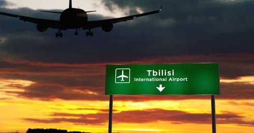 Airplane-silhouette-landing-in-Tbilisi-Georgia