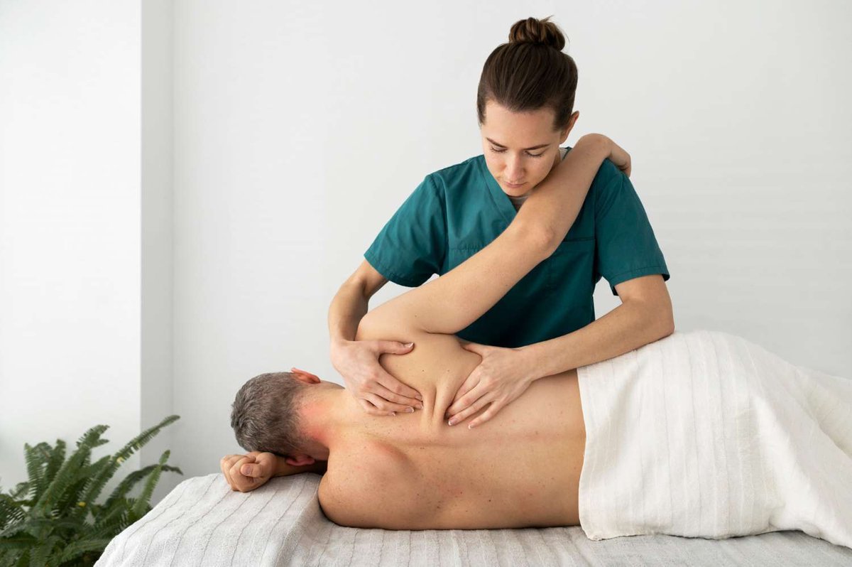 Back massage for a man lying on his side