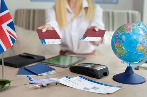 a girl with passports and plane tickets