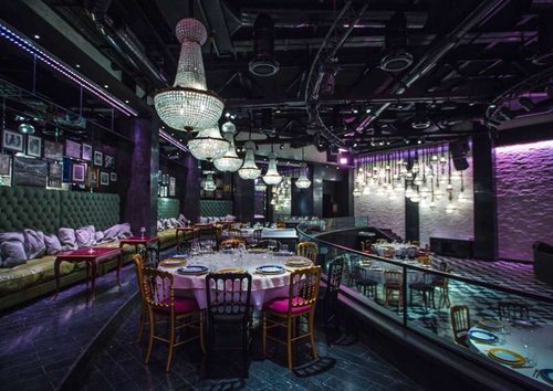 Expensive restaurant interior with colorful lighting