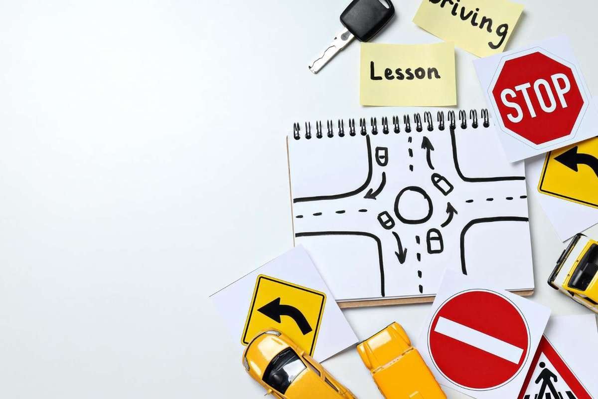 road signs, car, notebook, key