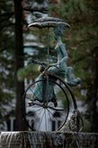 Fountain "Lady with a dog on a bicycle"