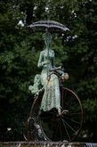 Fountain "Lady with a dog on a bicycle"