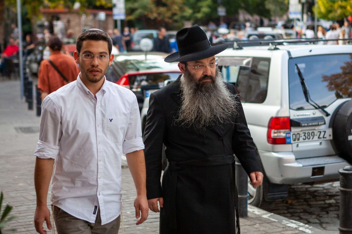 Georgian-Jewish-men-walking-in-the-street-in-Tb