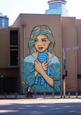 Girl with a toy hare