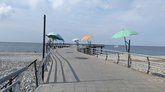 The beach to the left of the pier
