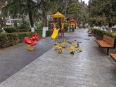 Children's playground and park on the banks of the Kura River