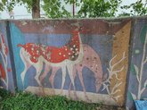Soviet mosaic fence and facade decoration
