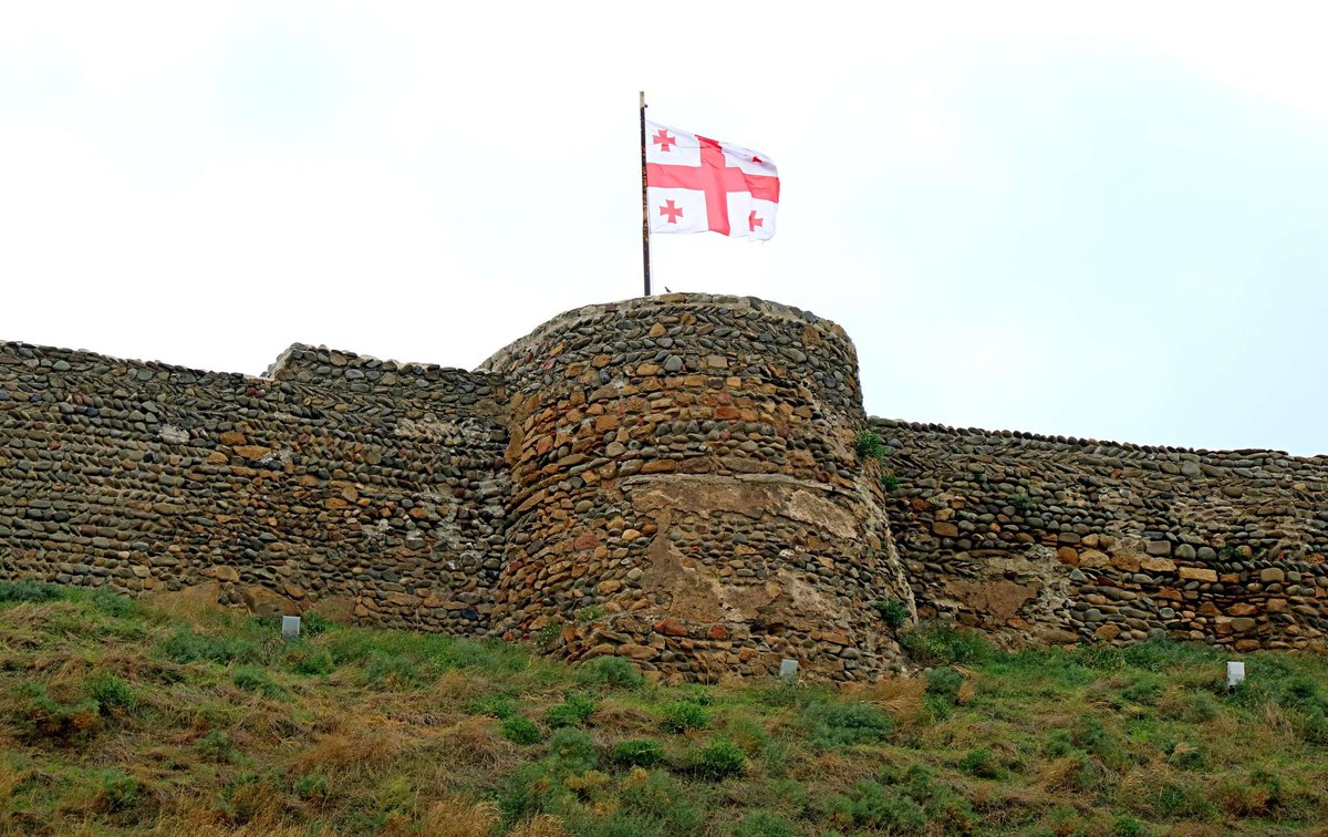 The Georgian flag on the Gori Fortress