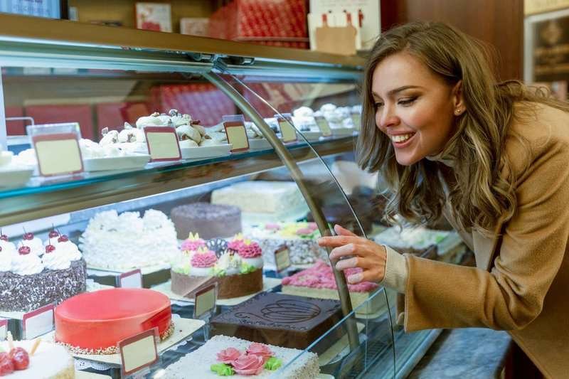 The girl saw the cake of her dreams in the shop window