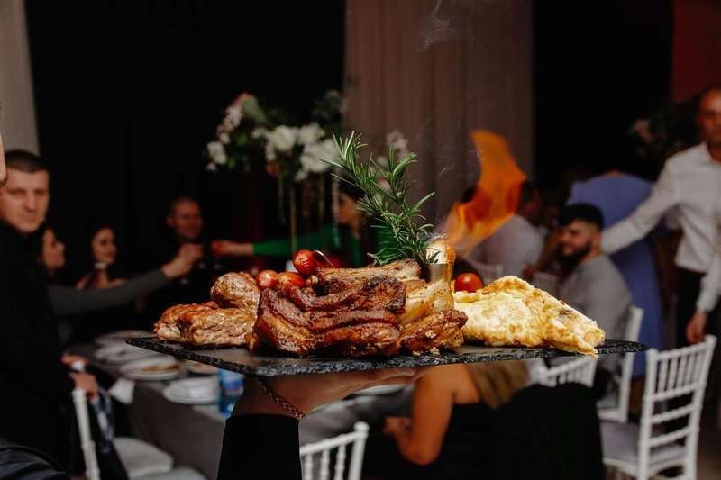 a platter of food with a fire on it