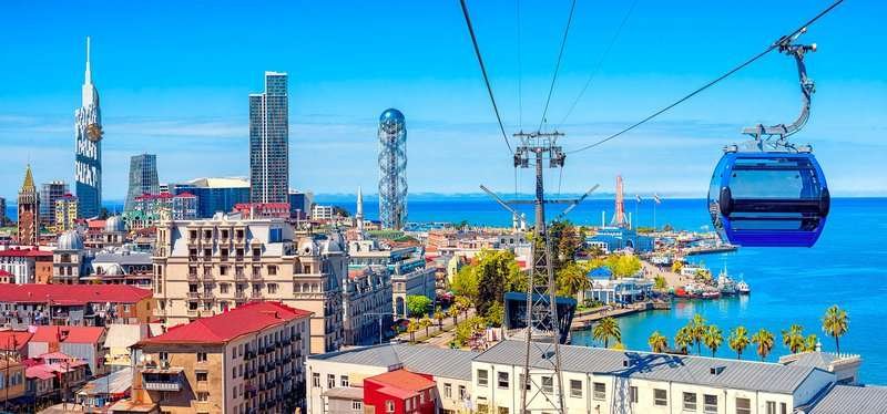 Cable car in Batumi with a view of the houses
