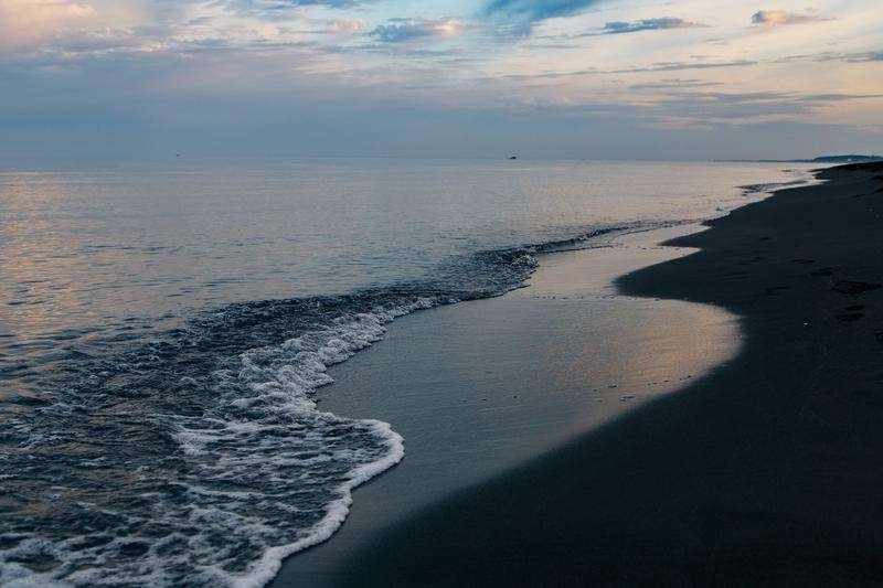 Black sand and black sea of Ureki