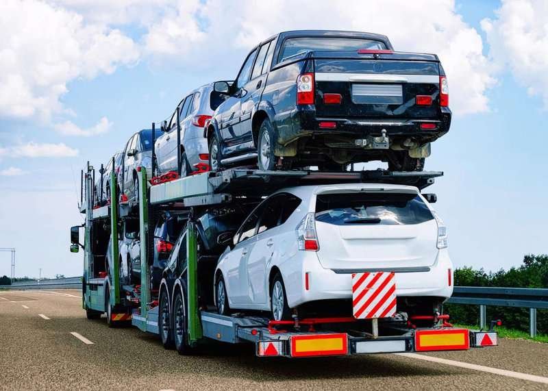 Car transporter on the road