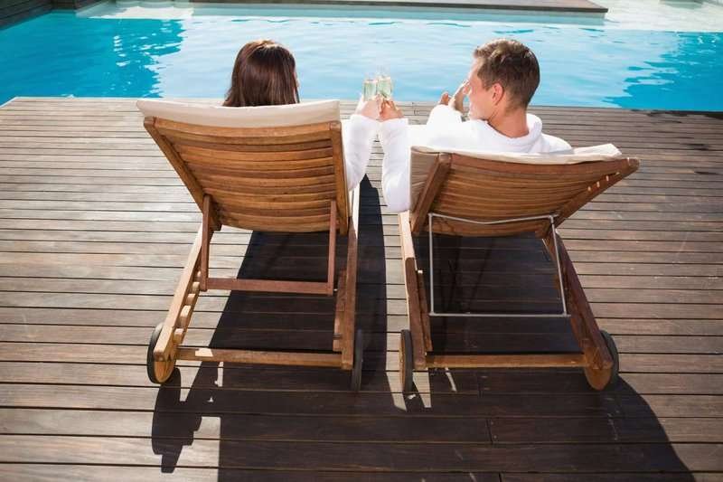 Young couple by the pool