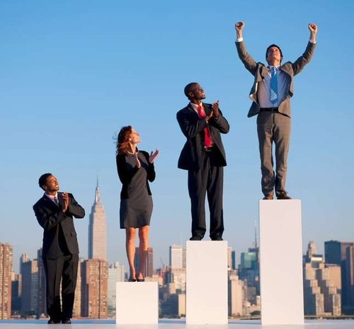 a group of people standing on a pedestal, a career ladder