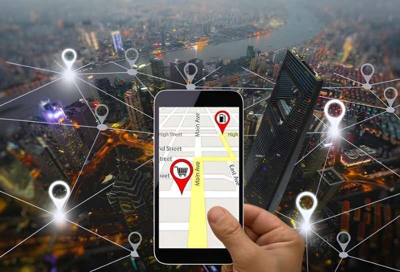 Google Maps on a smartphone with shopping center markers on the screen