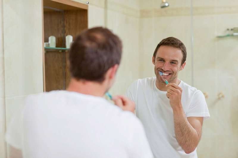 man-brushing-his-teeth