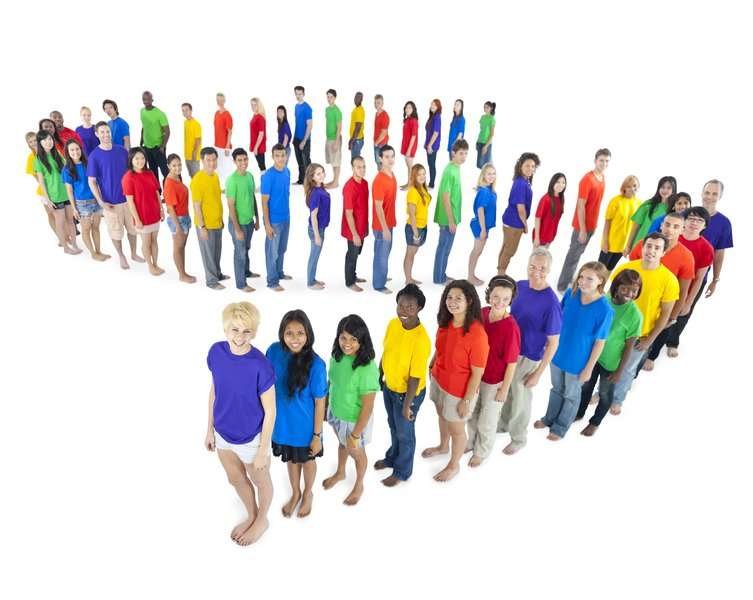 multi ethnic group of people standing in line