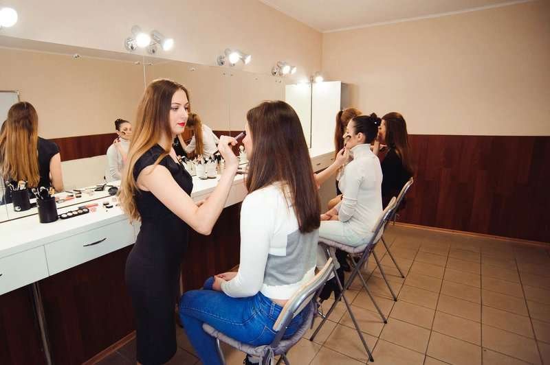 three-professional-make-up artists-working-w.max-800x600