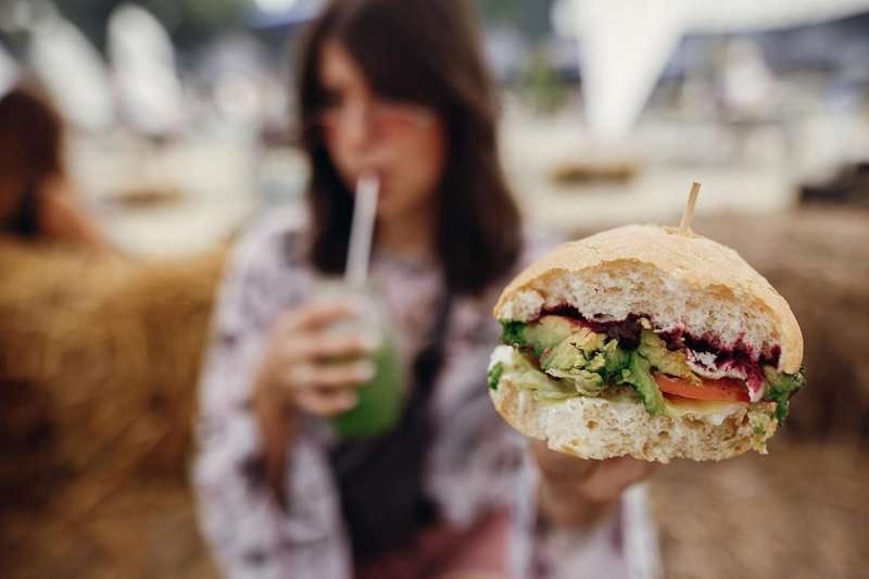 girl with a vegan burger