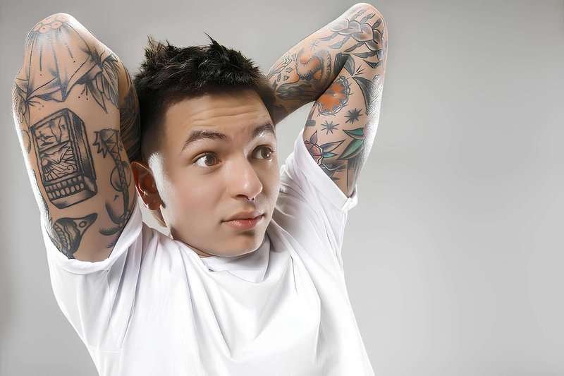 Young attractive man looking surprised